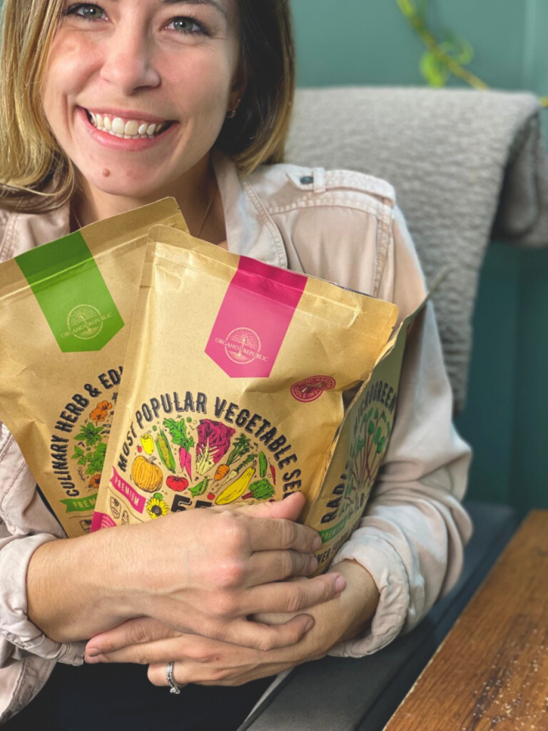 close up of organo republic seeds in woman's arms